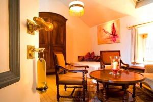 Posezení v ubytování Hotel Altes Pfarrhaus Beaumarais