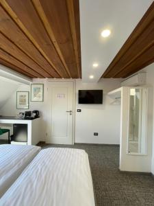 Ένα ή περισσότερα κρεβάτια σε δωμάτιο στο Villa Quattro Ducati