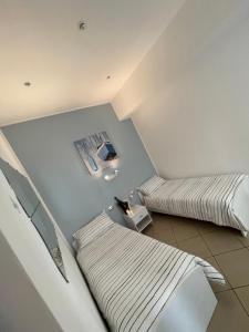 Ένα ή περισσότερα κρεβάτια σε δωμάτιο στο HOME SWEET HOME Inizio di Spacca Napoli