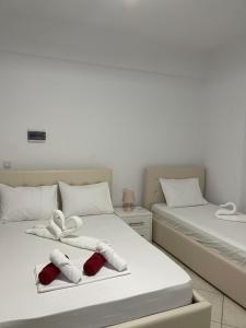Postel nebo postele na pokoji v ubytování Orea Hotel