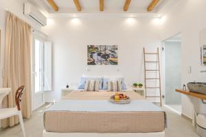 Ein Bett oder Betten in einem Zimmer der Unterkunft Elite Suites Naxos