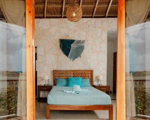 Voodi või voodid majutusasutuse Hotel Itza Coba toas