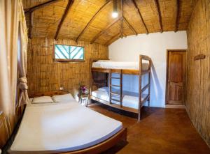 Krevet ili kreveti u jedinici u okviru objekta Hostal Rutamar