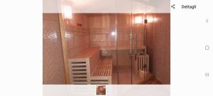 a bathroom with a shower and a ladder in it at Dimora Charleston Lecce parcheggio privato in loco gratis in Lecce +37 photos
