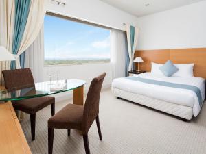 Postel nebo postele na pokoji v ubytování Hotel Francs