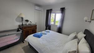 Posteľ alebo postele v izbe v ubytovaní Apartments Amadea