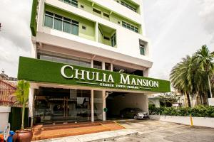 a building with a sign that reads chihuahua mansion at Chulia Mansion in George Town