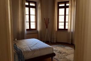 A bed or beds in a room at CasaLonghi