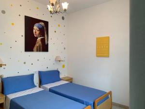 Posteľ alebo postele v izbe v ubytovaní Albergo Stella