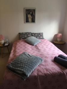 Tempat tidur dalam kamar di Skorstensfejerens Bed & Breakfast