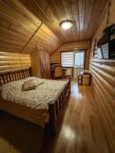 Postel nebo postele na pokoji v ubytování GorodOk
