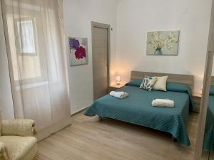 Posteľ alebo postele v izbe v ubytovaní Maqueda Apartament for 4 Palermo Centre Ballarò