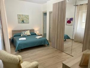 Posteľ alebo postele v izbe v ubytovaní Maqueda Apartament for 4 Palermo Centre Ballarò