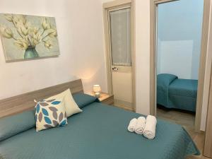 Posteľ alebo postele v izbe v ubytovaní Maqueda Apartament for 4 Palermo Centre Ballarò