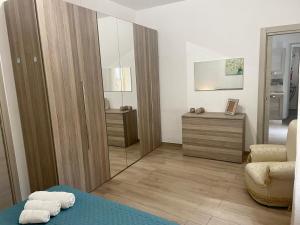 Posteľ alebo postele v izbe v ubytovaní Maqueda Apartament for 4 Palermo Centre Ballarò