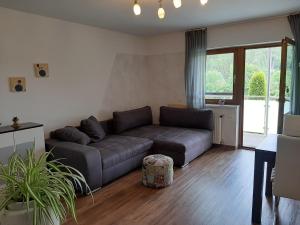 A seating area at Ferienhaus Blümel inkl. freier Strandbadeintritt
