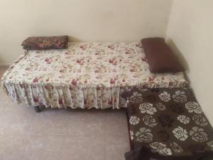 Un pat sau paturi într-o cameră la Bon vacence