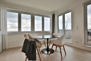 Χώρος καθιστικού στο Strandperle Ostsee Penthouse Suite 2