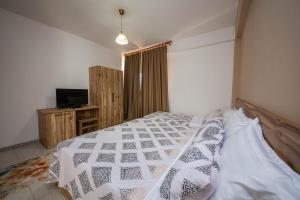 Postel nebo postele na pokoji v ubytování Hotel Zen