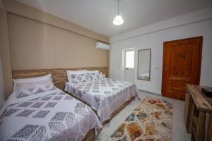 Postel nebo postele na pokoji v ubytování Hotel Zen