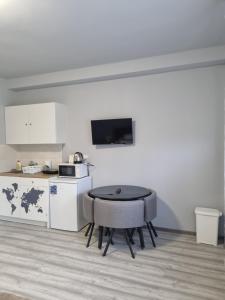 Kuchyňa alebo kuchynka v ubytovaní Lilian apartmanház