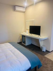 Una cama o camas en una habitación de Usadba Berezino