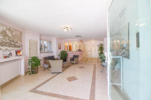 Lobby alebo recepcia v ubytovaní Etna-Royal-View-Appartamento-Bilocale-Vista-Giardino