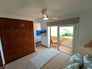 Posteľ alebo postele v izbe v ubytovaní VILLA VEGA RELAX EN EL PARAISO