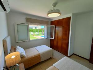 Posteľ alebo postele v izbe v ubytovaní VILLA VEGA RELAX EN EL PARAISO