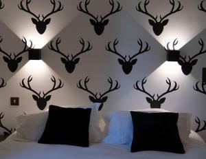 Chalet Appart'Hôtel l'Eau Vive客房内的一张或多张床位