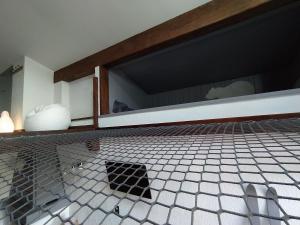 Chalet Appart'Hôtel l'Eau Vive客房内的一张或多张床位