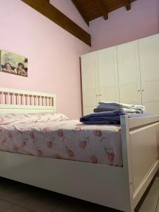 Cama ou camas em um quarto em Casa Mimì