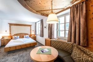 Posteľ alebo postele v izbe v ubytovaní Alpenhotel Kramerwirt