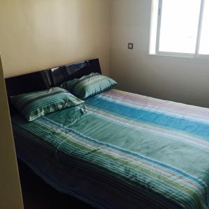 Postel nebo postele na pokoji v ubytování Alcudia Smir