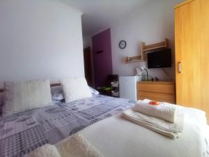 Posteľ alebo postele v izbe v ubytovaní willa Majfill
