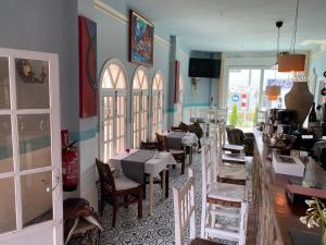 Reštaurácia alebo iné gastronomické zariadenie v ubytovaní El Chili Boutique Hotel