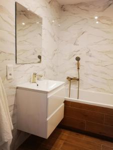 Kúpeľňa v ubytovaní Apartament Korczaka Centrum + 5 fotografií