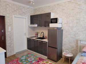 Kuchyň nebo kuchyňský kout v ubytování Apartman "Toskana"