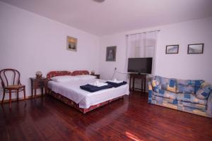Posteľ alebo postele v izbe v ubytovaní Red House Veli Lošinj