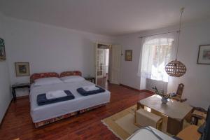 Posteľ alebo postele v izbe v ubytovaní Red House Veli Lošinj