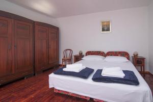 Posteľ alebo postele v izbe v ubytovaní Red House Veli Lošinj