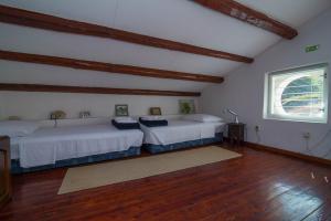 Posteľ alebo postele v izbe v ubytovaní Red House Veli Lošinj