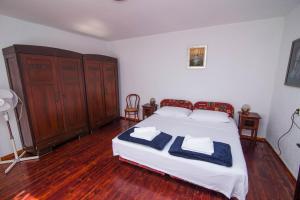 Posteľ alebo postele v izbe v ubytovaní Red House Veli Lošinj