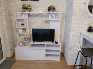TV a/nebo společenská místnost v ubytování Apartman "Toskana"