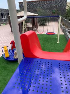 Vaikų žaidimų erdvė apgyvendinimo įstaigoje Aljabal Al Akhdar Olive Tree Guest house