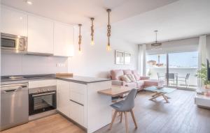 Kuchyň nebo kuchyňský kout v ubytování Apartamento en la costa