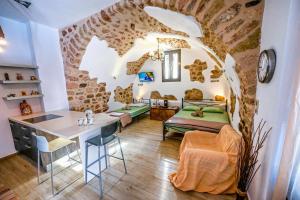 Posezení v ubytování Καμάρα Χωριό Φοινίκι , Kamara Finiki Village