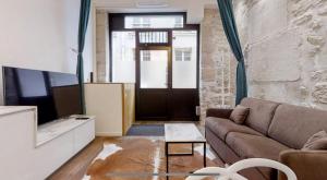 Loft HeartofParis, Marais,Chatelet, Beaubourg CLIM tesisinde bir oturma alanı