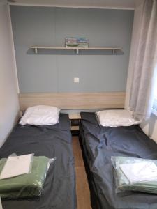 Posteľ alebo postele v izbe v ubytovaní Mobil-home Narbonne-Plage