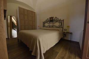 Postel nebo postele na pokoji v ubytování GAPO Rooms